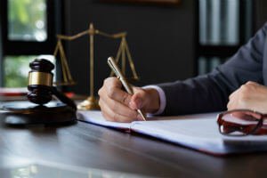 personal injury lawyer writing