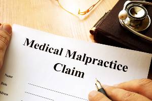 writing on medical malpractice form