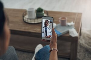 woman having facetime call with doctor