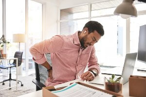 worker with back pain