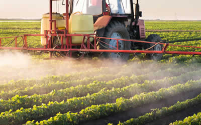 tractor spraying crops