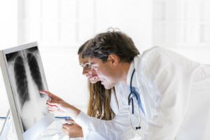 doctors looking at an xray