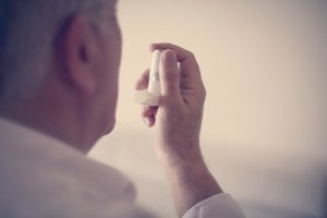 man holding an inhaler