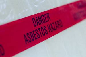 red tape warning about asbestos hazard