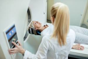 woman about to go into mri machine